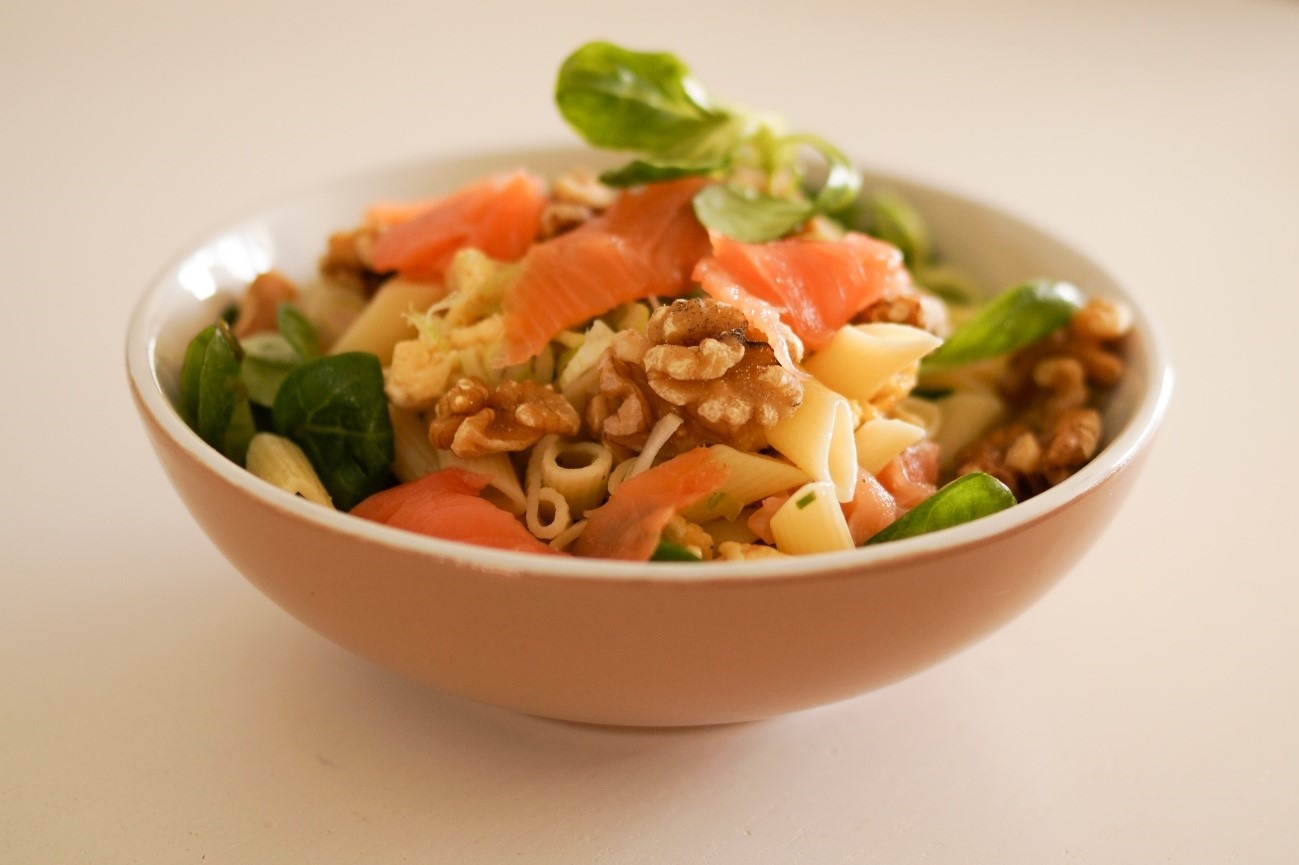 Nuts and salmon salad with virgin olive oil